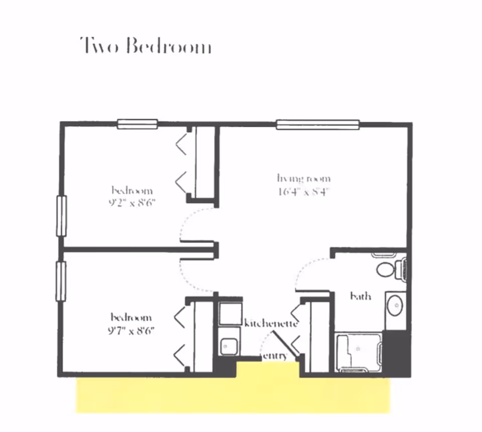 Floor plan of a two-bedroom apartment showing two bedrooms, a living room, a kitchenette, an entry, and a bathroom.