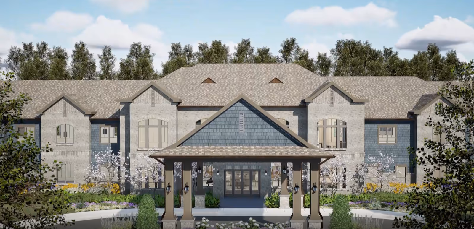 Exterior of Harmony at Douglasville senior living facility with a covered entrance and landscaped grounds.