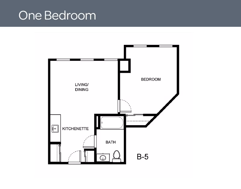 Floor plan labeled One Bedroom showing a layout with a bedroom, living/dining area, kitchenette, and bathroom. The bathroom includes a bathtub, toilet, and sink. The kitchenette is adjacent to the living/dining area. The plan is labeled B-5.