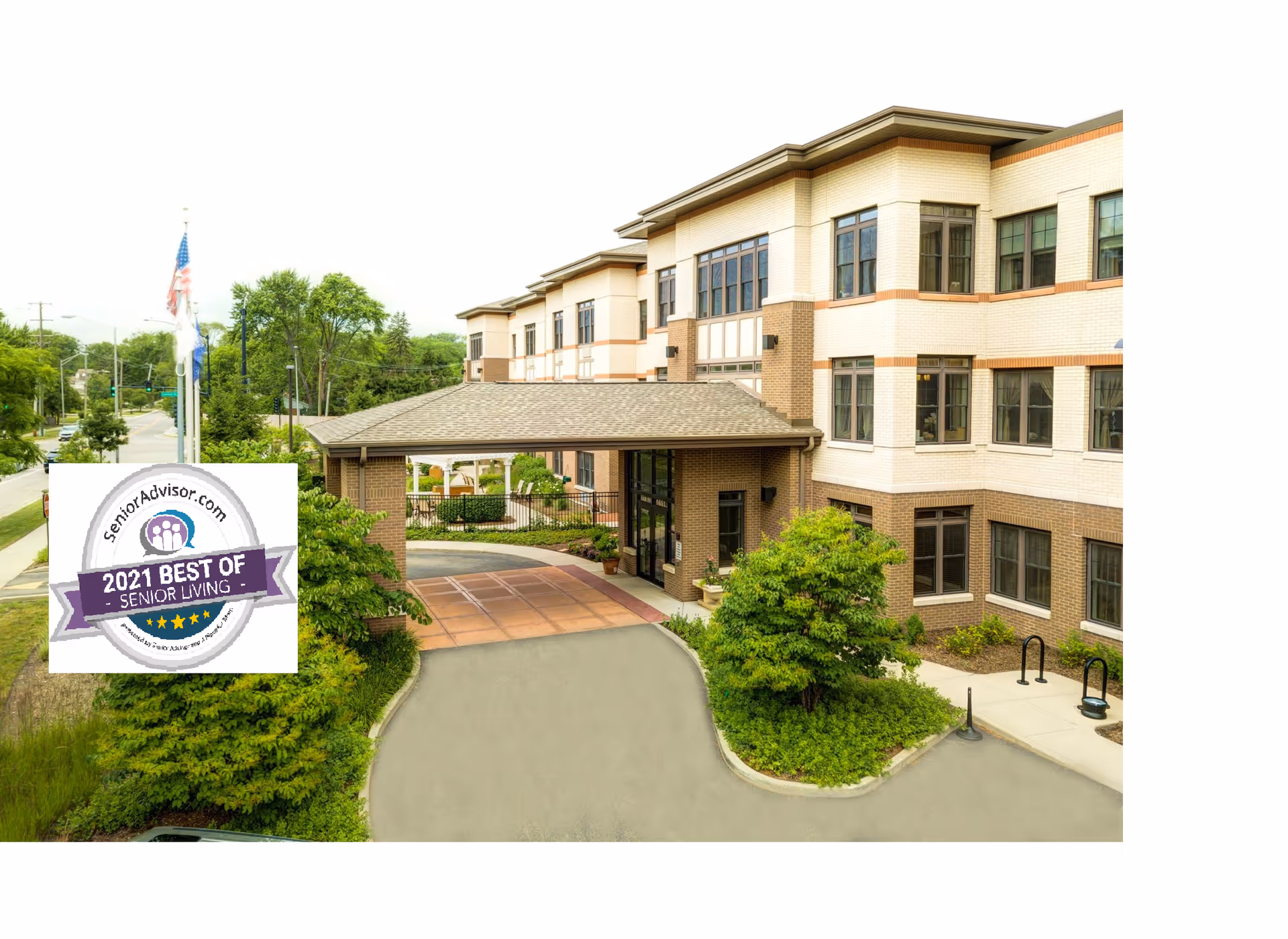 Exterior view of The Auberge at Highland Park senior living facility showing a three-story building with a covered entrance, surrounded by greenery and trees, with a driveway leading to the entrance.