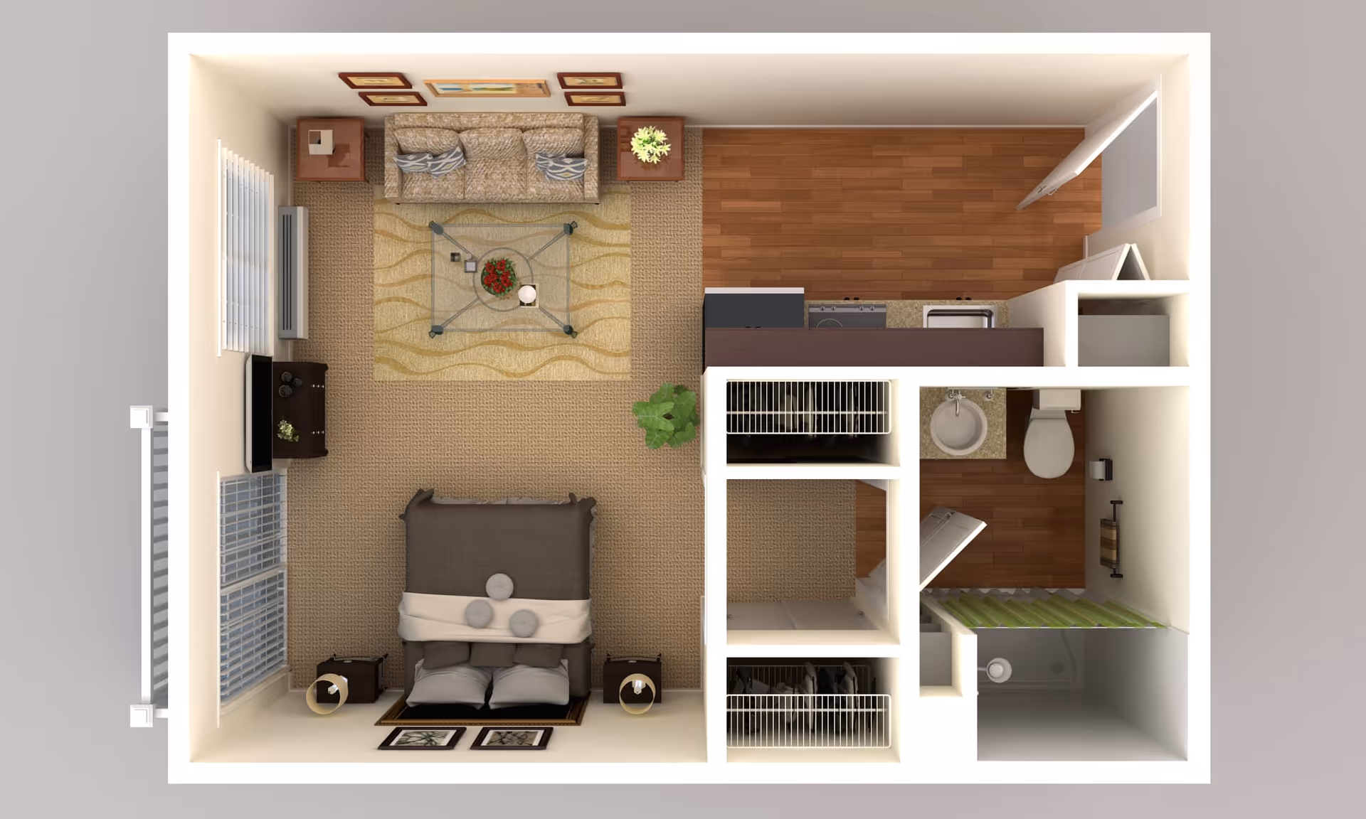 Top-down view of a senior living studio apartment floor plan featuring a combined living and sleeping area with a bed, sofa, coffee table, TV, and side tables. The kitchen area includes a stove, sink, and refrigerator. There is a bathroom with a toilet, sink, and shower, and two closets near the entrance.