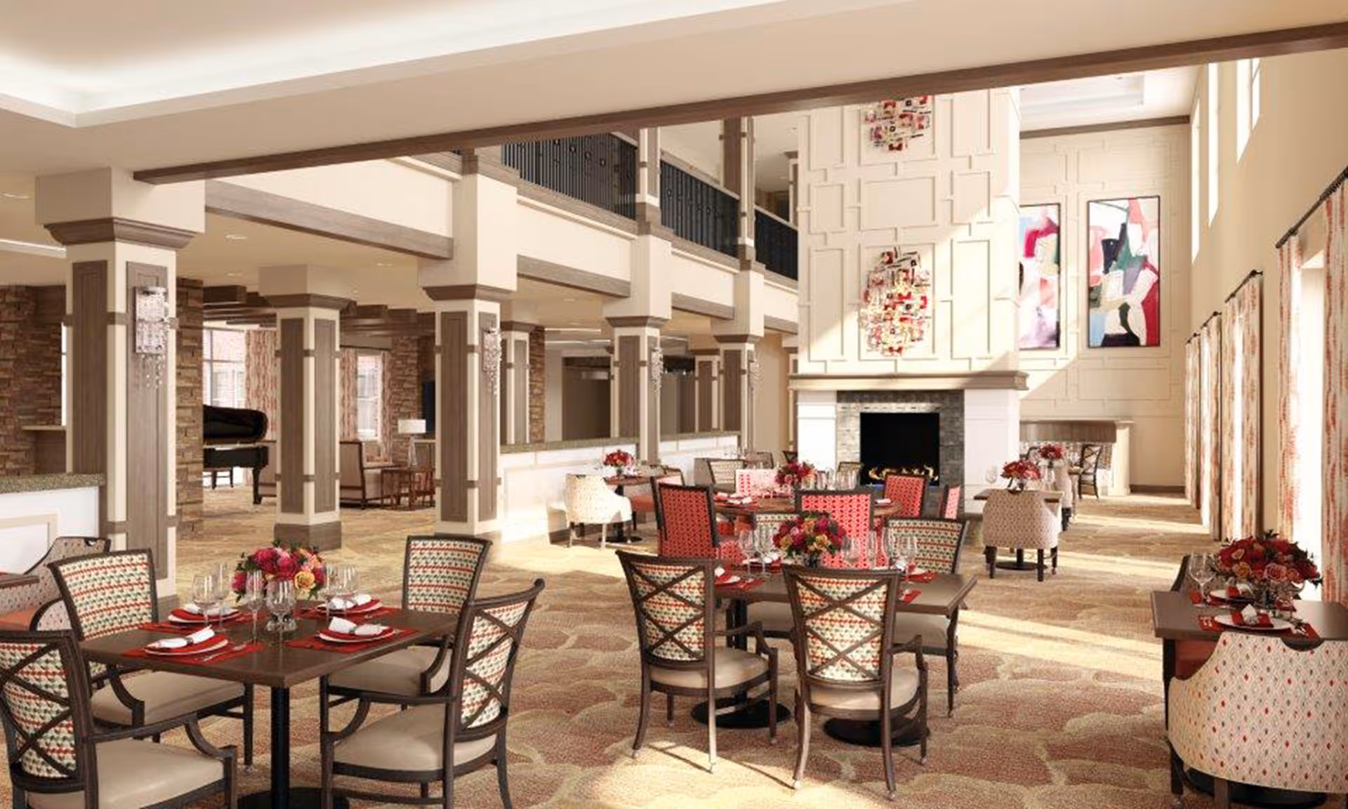 A spacious and elegant dining room in a senior living facility with multiple tables set for meals. The room features patterned chairs, floral centerpieces, large windows with curtains, a fireplace, and decorative wall art. The area is well-lit with natural light and has a warm, inviting atmosphere.