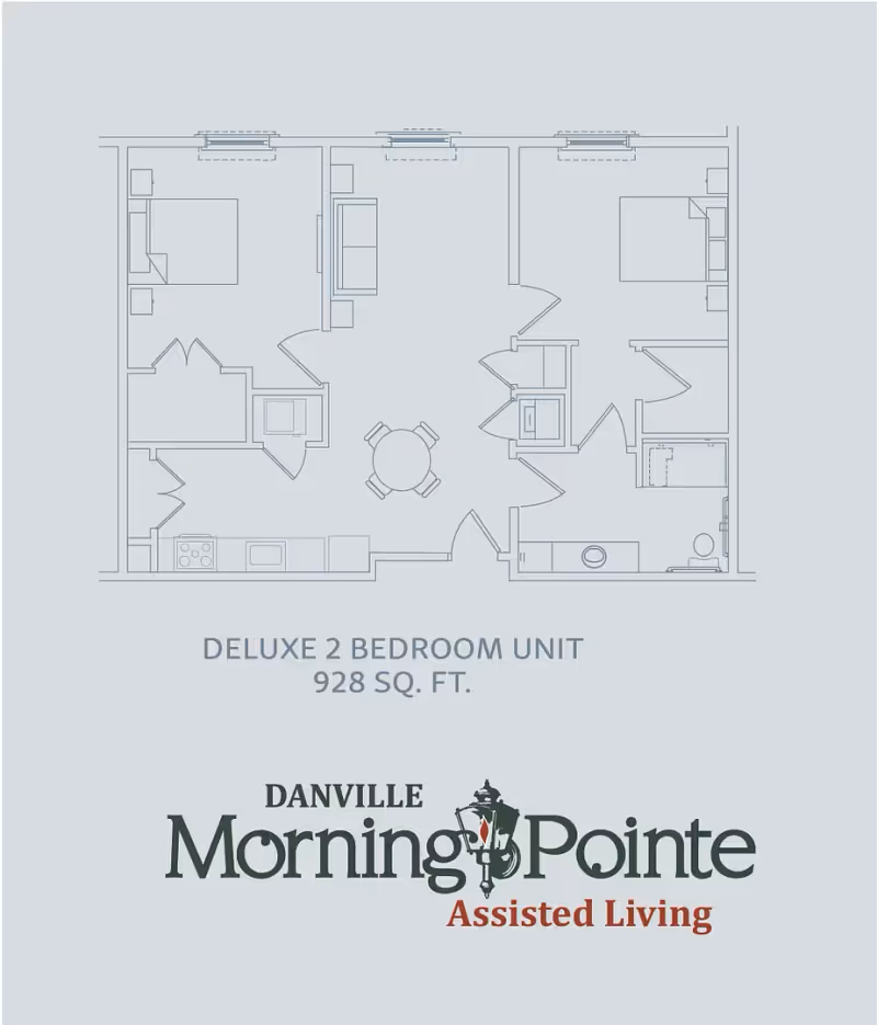 Architectural floor plan of a deluxe 2 bedroom unit with 928 square feet, showing layout including two bedrooms, a living area with a round table and chairs, kitchen, bathroom, and closets.