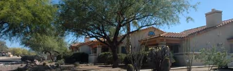 Front view of Horizon Heights Lifestyle senior living facility with desert landscaping.