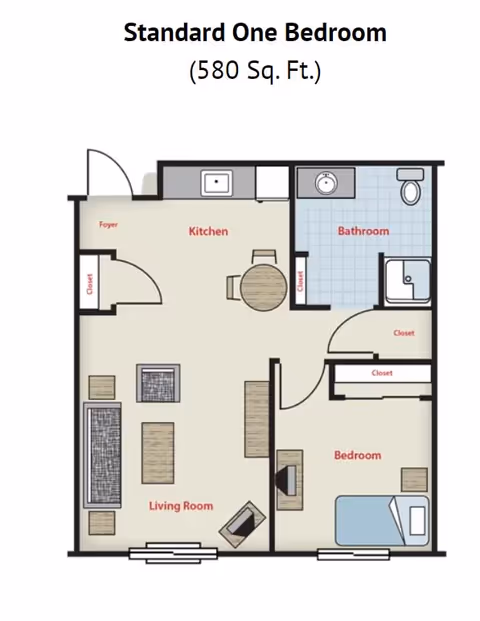 Floor plan of a standard one-bedroom apartment with 580 square feet. The layout includes a foyer, kitchen with a small dining table, bathroom, living room with seating and a TV, and a bedroom with a bed and closets.