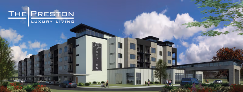 Exterior view of The Preston Luxury Living, a modern multi-story residential building with balconies, large windows, and landscaped surroundings under a partly cloudy sky.