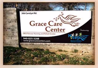 Exterior Grace Care Center sign mounted on a stone wall with surrounding greenery.