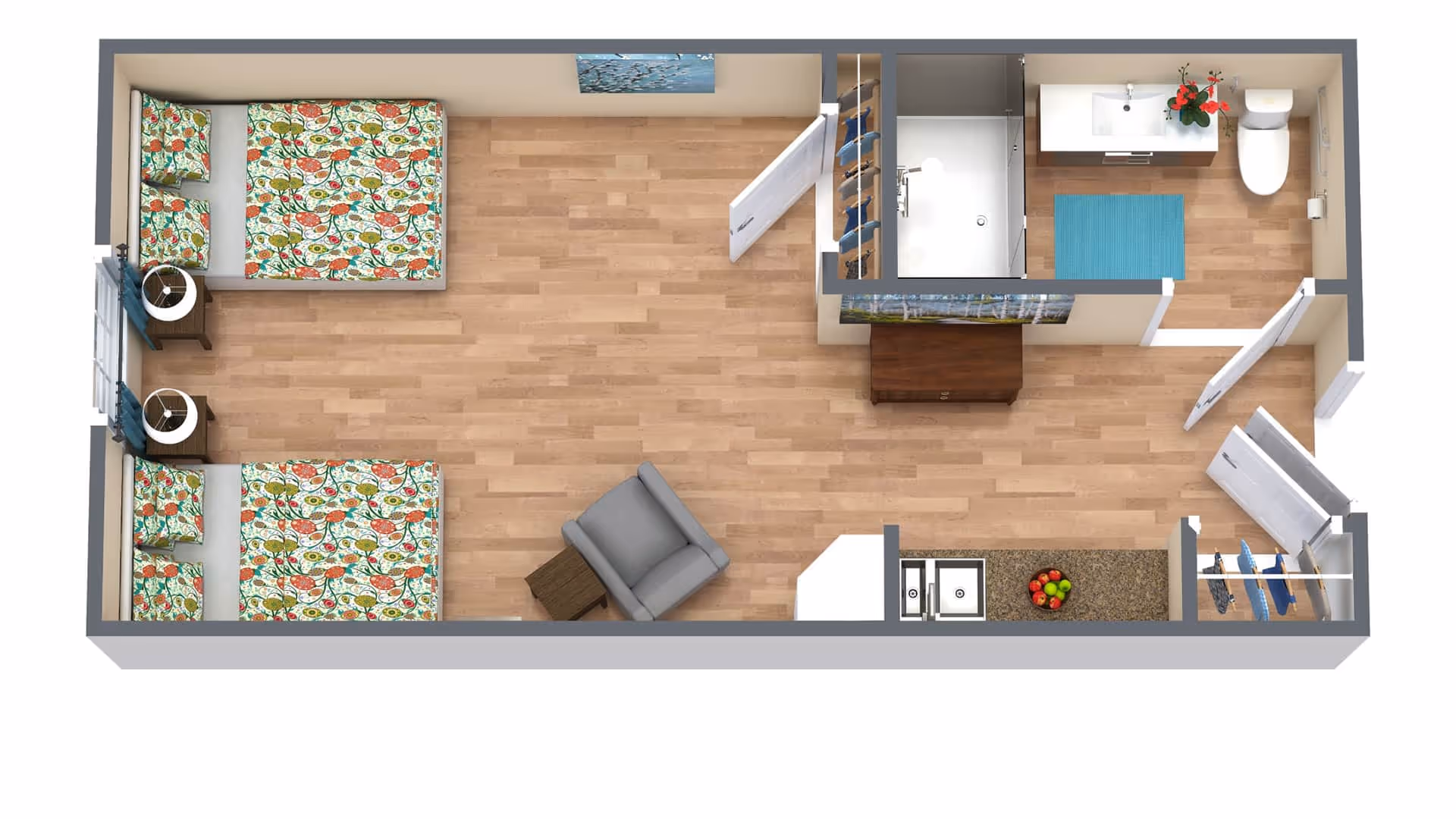 Top-down view of a small apartment floor plan featuring two beds with floral bedspreads, two nightstands with lamps, a gray armchair with a small side table, a bathroom with a shower, sink, and toilet, a kitchenette with a sink and countertop, and two closets with hanging clothes.