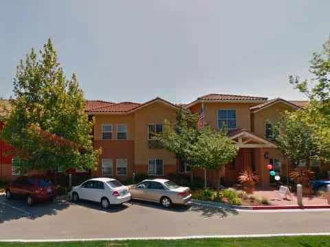 Front view of Pacifica Senior Living Union City building with parked cars