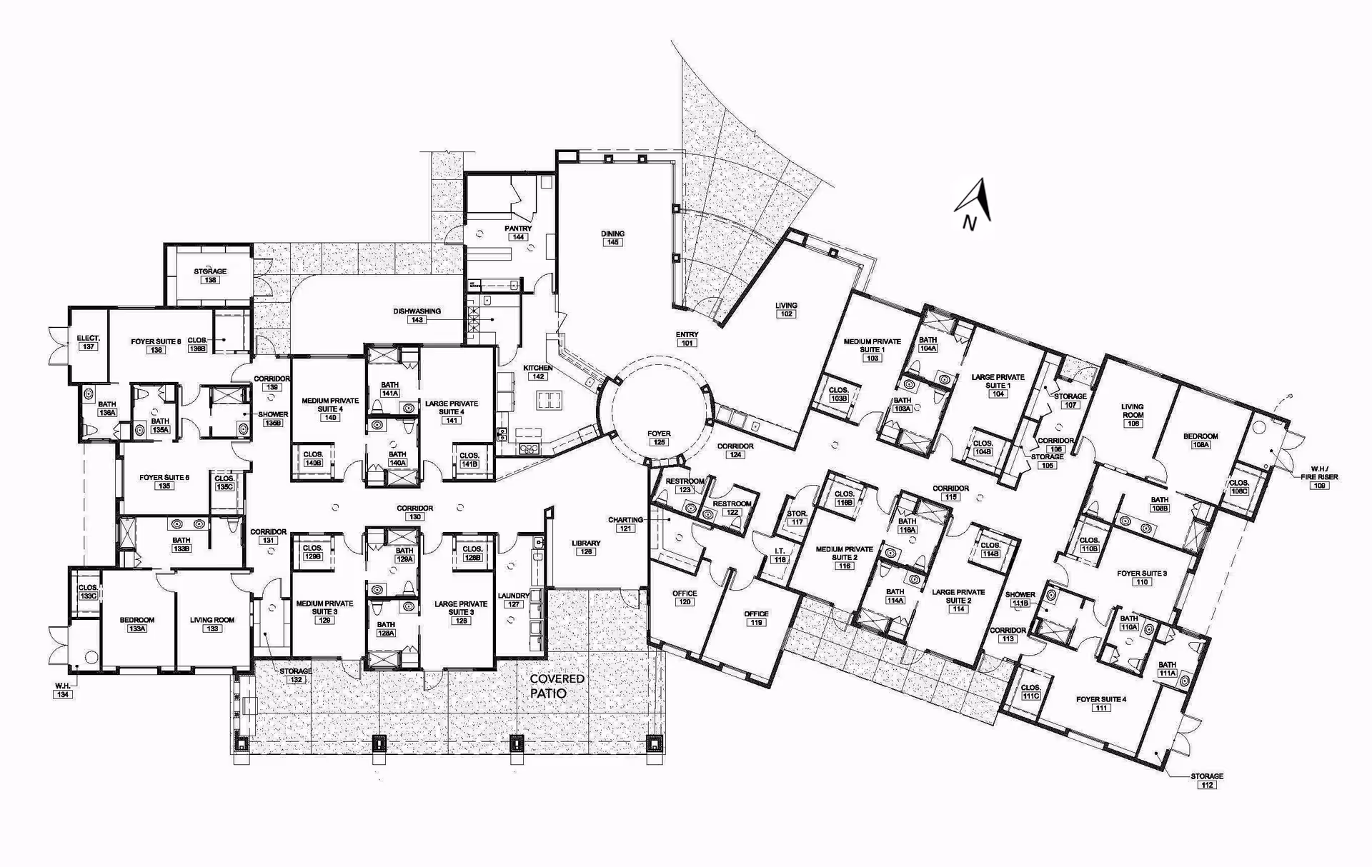 Architectural floor plan of Academy Villas facility showing various rooms including suites, bedrooms, living rooms, bathrooms, kitchen, dining area, pantry, laundry, library, offices, restrooms, storage, corridors, and covered patio.