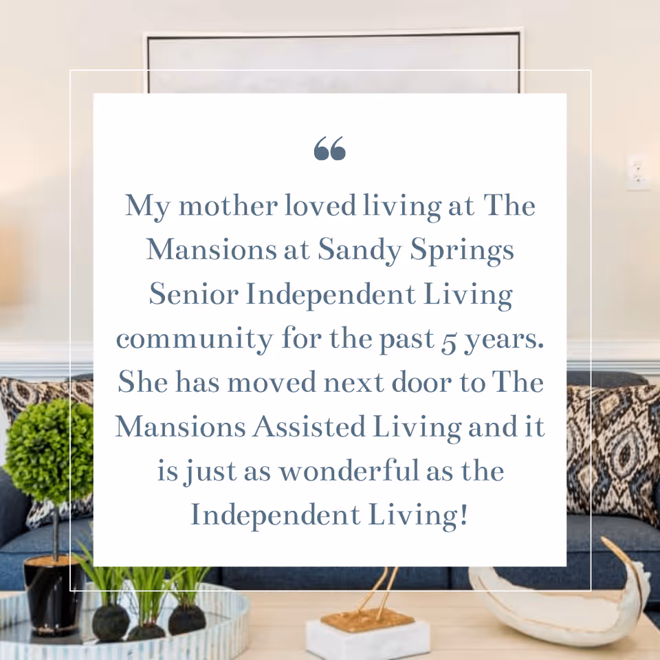 A testimonial quote displayed over a background of a living room with a blue couch, patterned pillows, a small green plant, and decorative items on a coffee table.