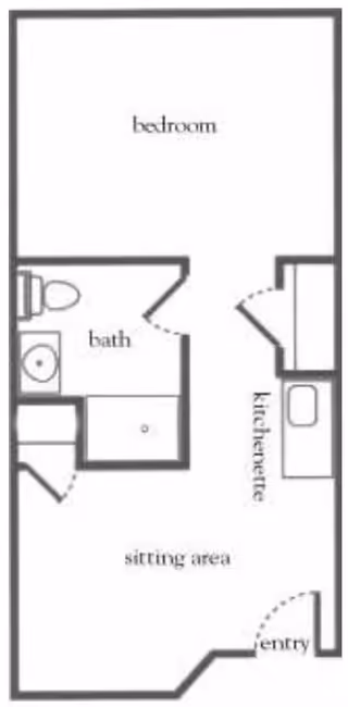 Floor plan of a living space showing a bedroom, bath, kitchenette, sitting area, and entry. The layout includes a bathroom with a toilet and sink, a kitchenette area with a counter and sink, and an open sitting area connected to the entry.