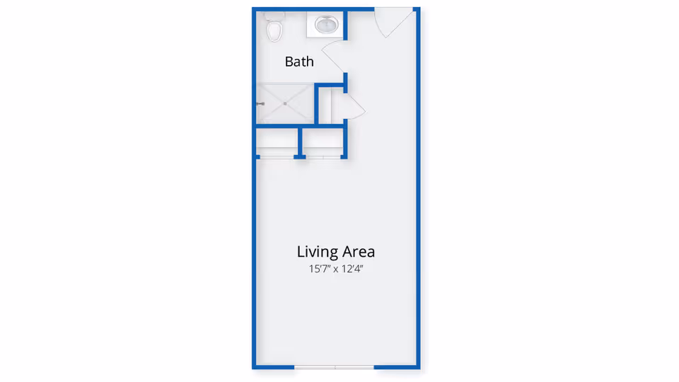 Floor plan of a unit at The Village at South Farms showing a living area measuring 15 feet 7 inches by 12 feet 4 inches, and a bathroom with a toilet, sink, and shower.