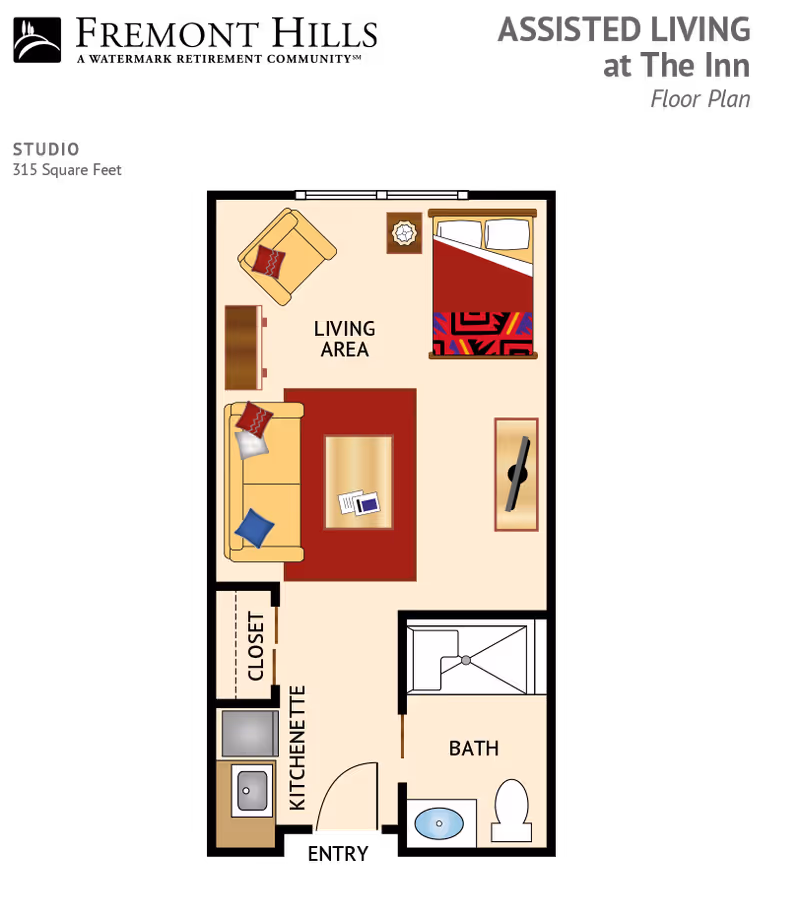 Floor plan of a studio assisted living apartment showing a living area with a bed, armchair, sofa, coffee table, and TV. There is a kitchenette with a sink and closet near the entrance, and a bathroom with a shower, sink, and toilet.