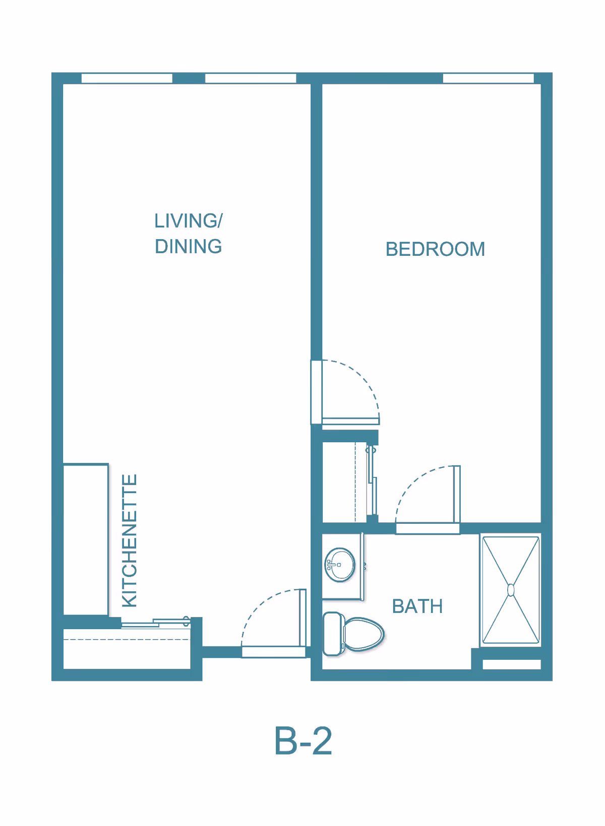 Floor plan layout labeled B-2 showing a living/dining area combined with a kitchenette, a separate bedroom, and a bathroom with a sink, toilet, and shower.