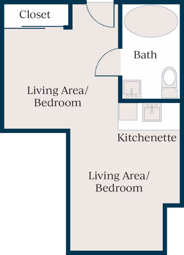 Floor plan of a senior living community studio apartment showing a living area/bedroom, kitchenette, bath with bathtub, toilet, and sink, and a closet.