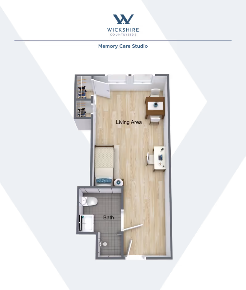 Top-down floor plan labeled 'Memory Care Studio' showing a studio layout with a living area containing a bed, desk, seating, and a separate bath.