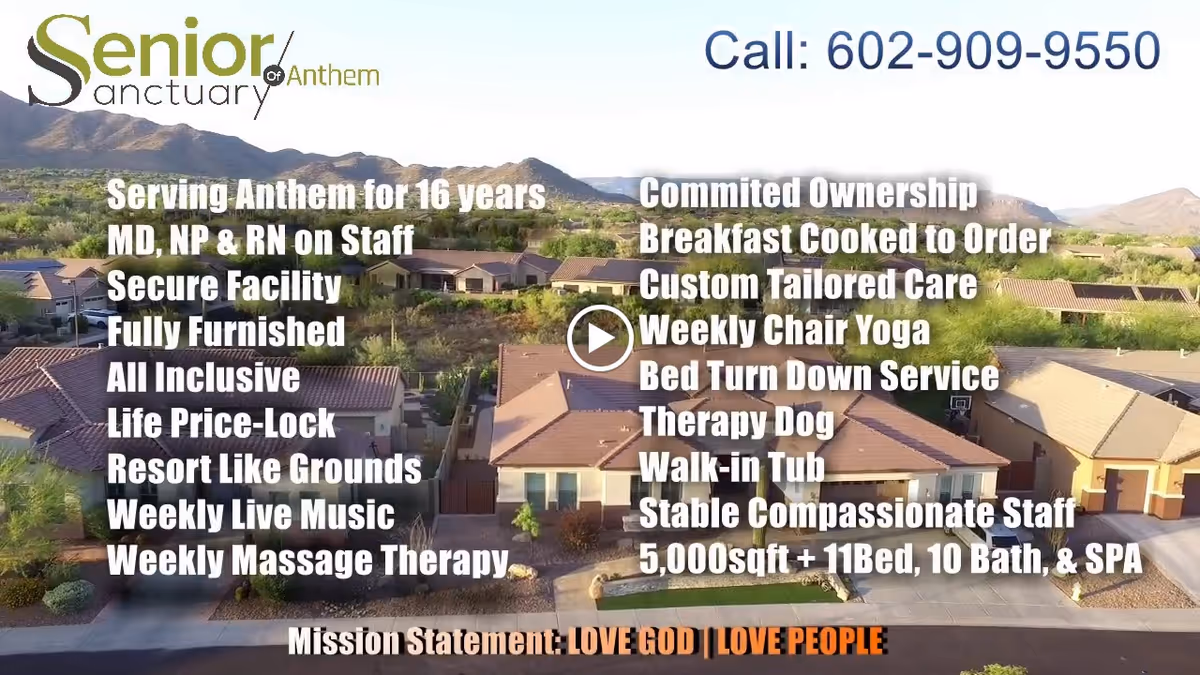 Aerial view of Senior Sanctuary of Anthem facility surrounded by desert landscape and mountains in the background. Text overlay lists features and services such as secure facility, fully furnished, weekly live music, therapy dog, walk-in tub, and more. The facility consists of multiple single-story buildings with tiled roofs and driveways.