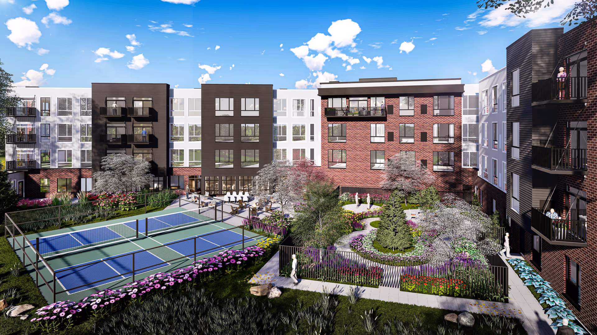 Courtyard of a senior living complex with pickleball courts, landscaped gardens, and surrounding apartment buildings.