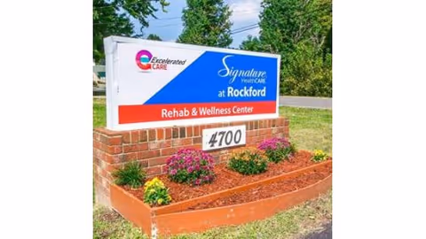 Outdoor landscaped sign reading "Signature HealthCARE at Rockford Rehab & Wellness Center" with the address number 4700.