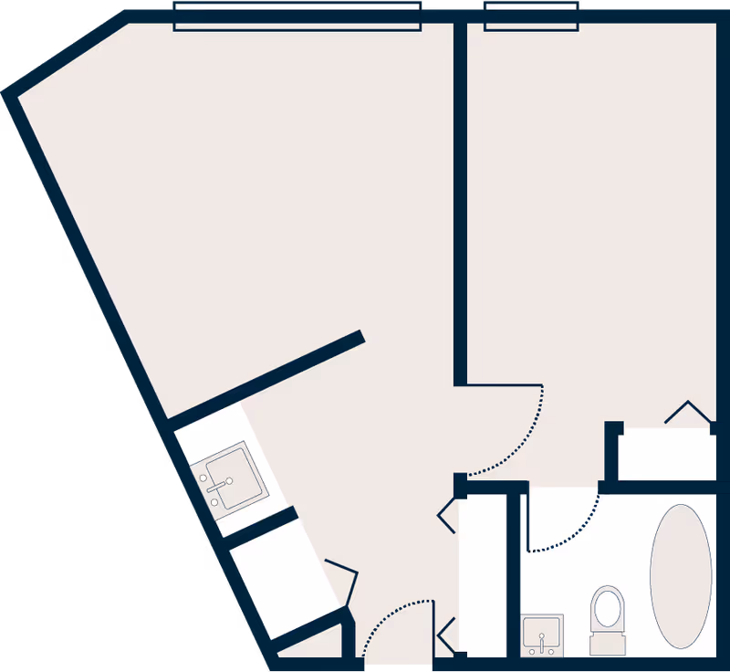 Schematic floor plan of an apartment unit showing walls, door swings, a bathroom with sink, toilet and tub, and a small sink area.