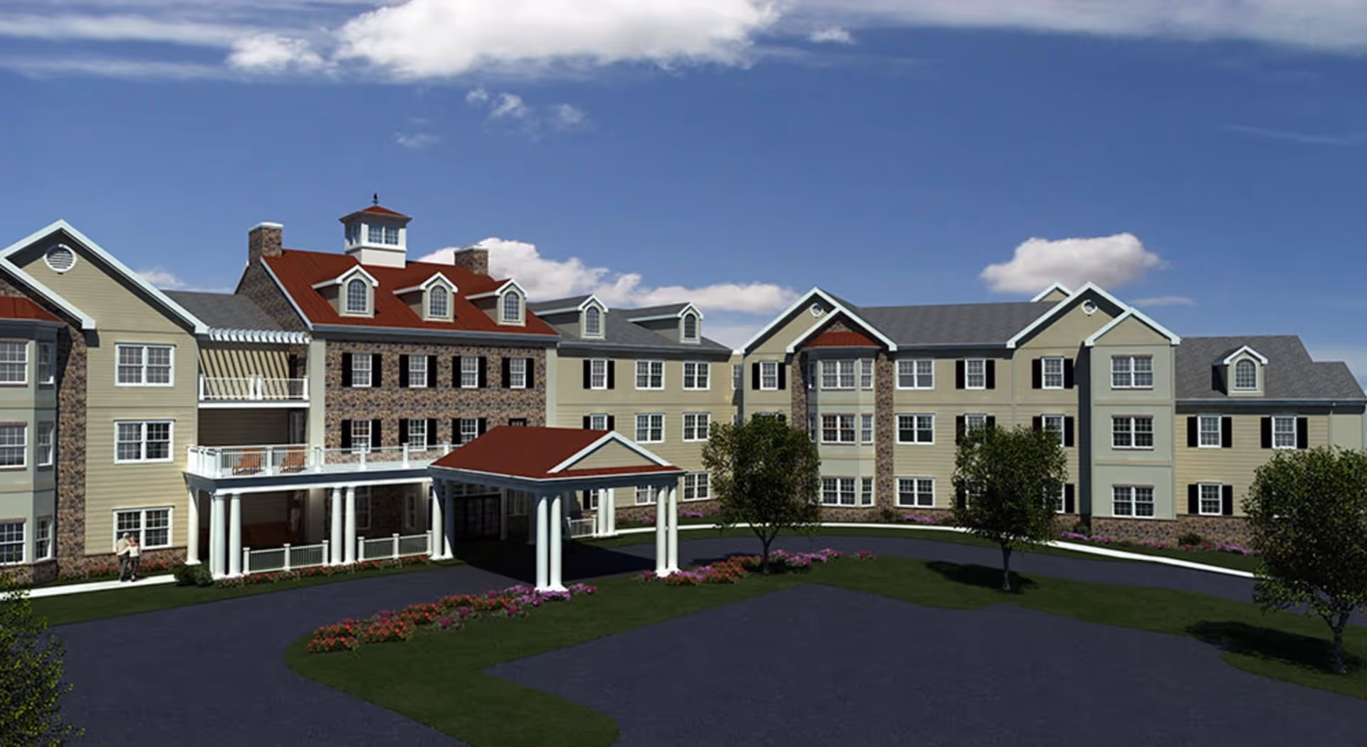 Exterior view of a large senior living facility building with multiple windows, a covered entrance with white columns, landscaped greenery, and a clear blue sky with some clouds.