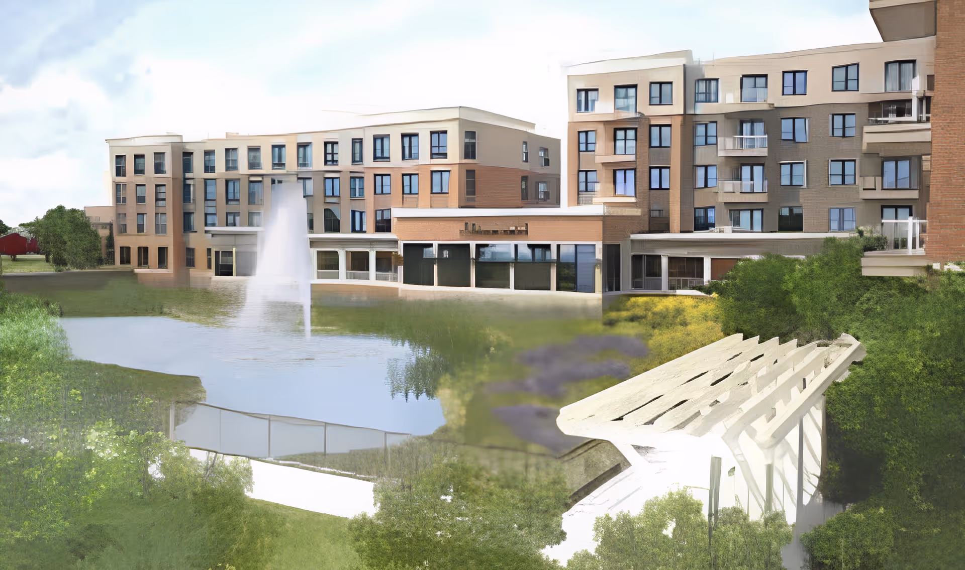 Modern multistory senior living building facing a pond with a fountain, landscaped grounds, and a white pergola in the foreground.