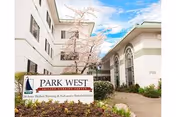 Exterior view of Avamere Rehabilitation at Park West building with sign.