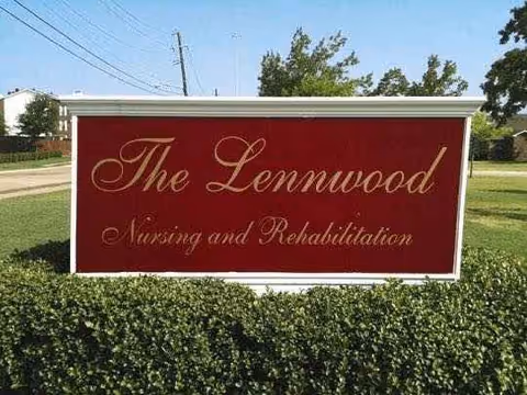 Red sign reading The Lennwood Nursing and Rehabilitation sits on a hedge in front.