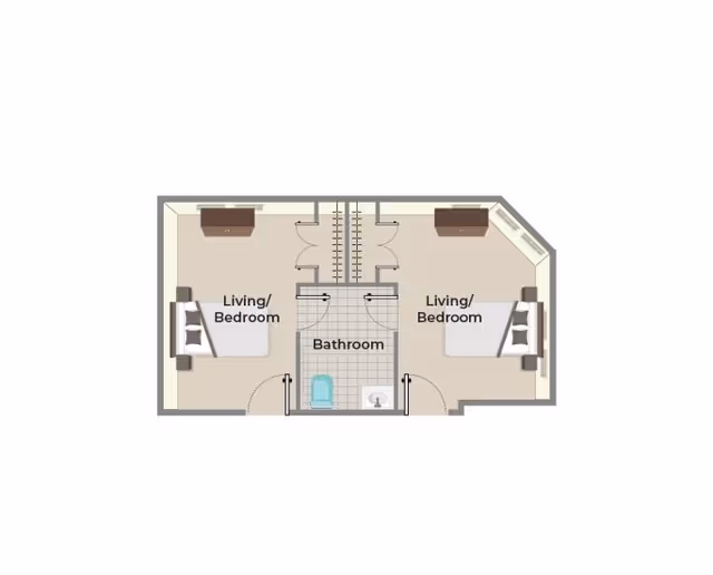 Floor plan showing two living/bedroom areas on either side of a central bathroom. Each living/bedroom area contains a bed and a dresser. The bathroom includes a toilet and a sink.