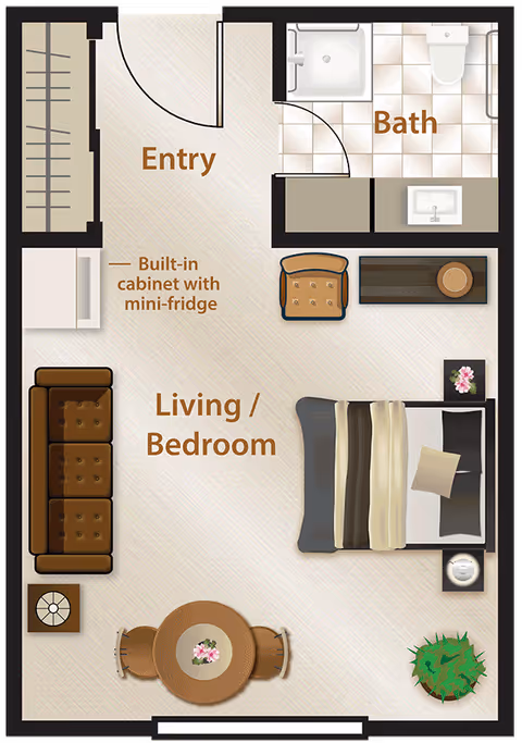 Floor plan of a small assisted living unit showing an entry area with a built-in cabinet and mini-fridge, a combined living and bedroom space with a sofa, armchair, bed, side table, round dining table with two chairs, and a plant. There is a separate bathroom with a shower, toilet, and sink.
