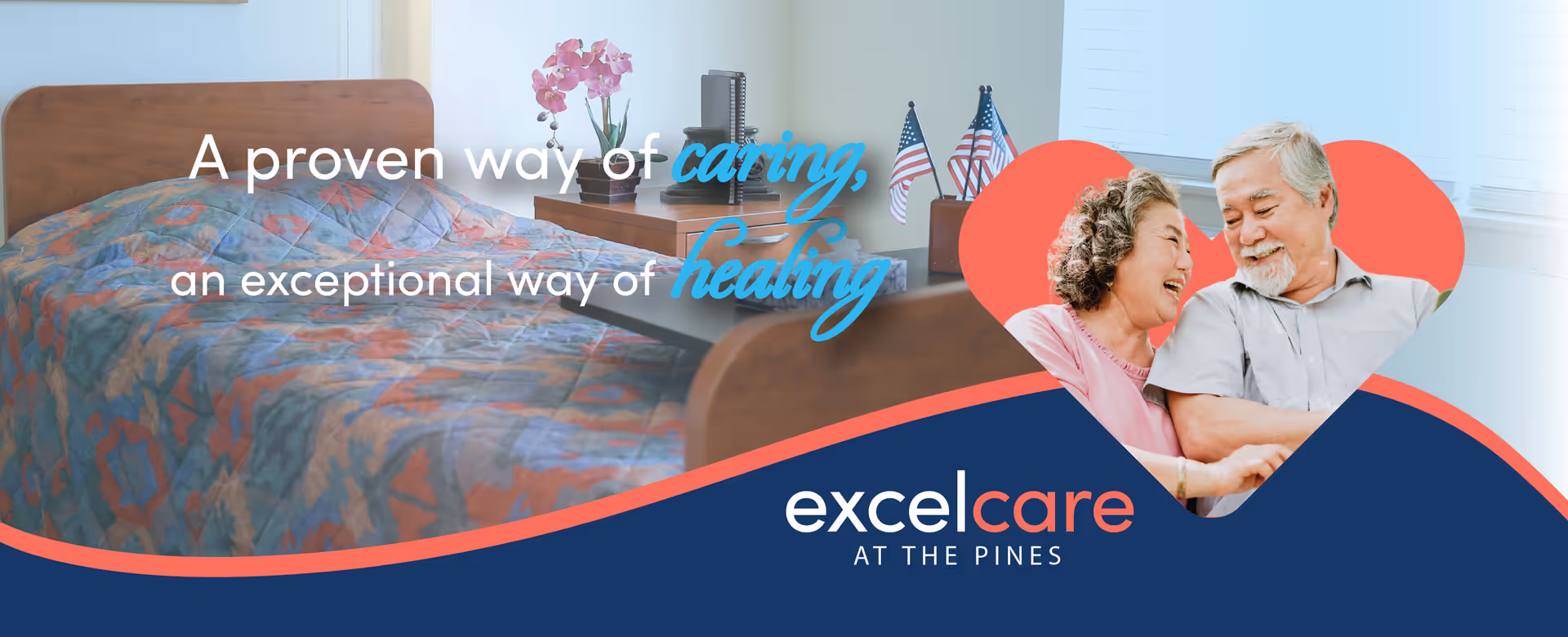 A cozy bedroom with a wooden bed covered by a colorful quilt, a nightstand with a pink orchid and two small American flags, and a window letting in natural light. Overlaid text reads 'A proven way of caring, an exceptional way of healing.' There is also a heart-shaped cutout showing a smiling elderly couple embracing, with the logo 'excelcare AT THE PINES' below.