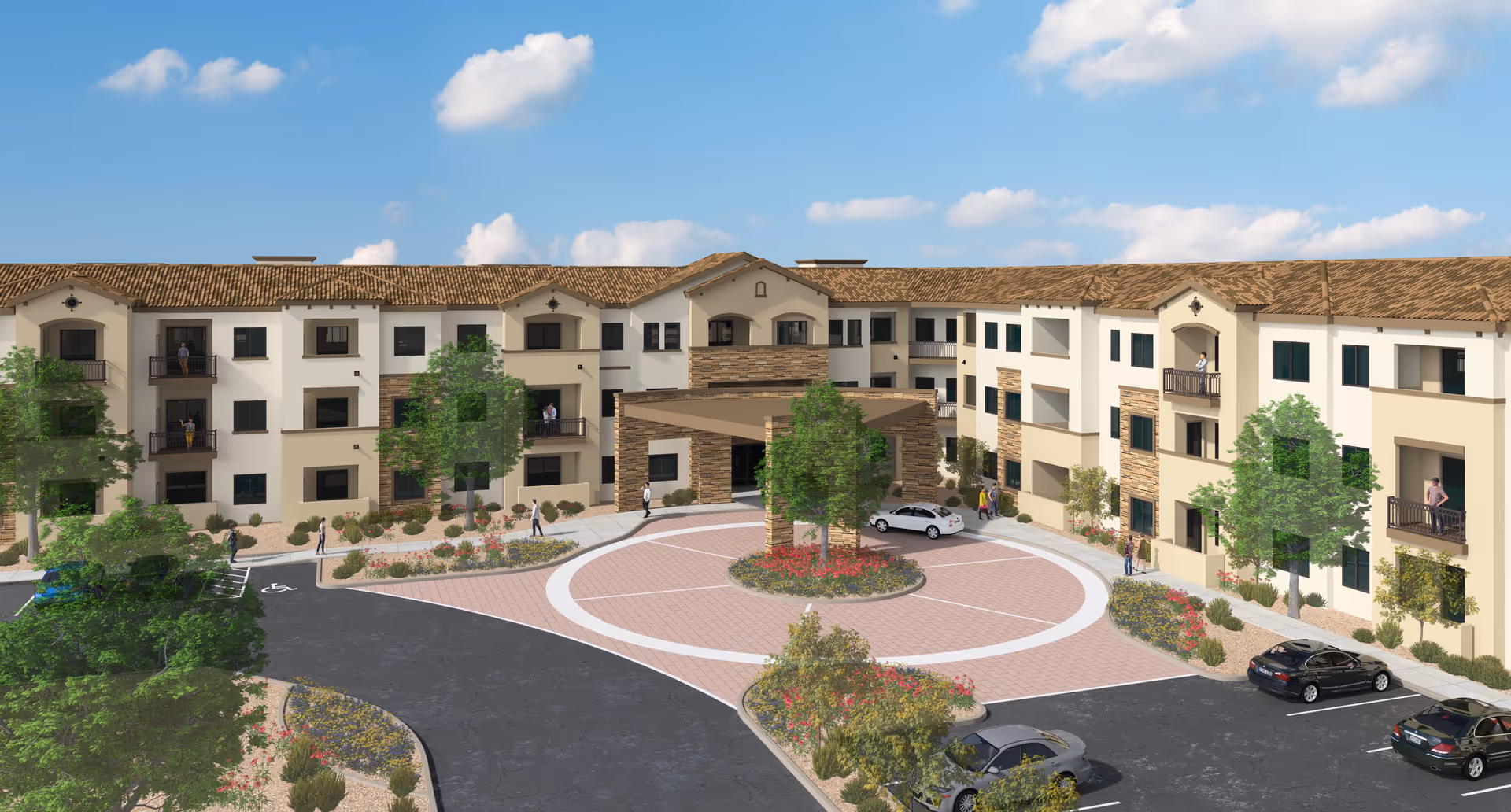Exterior view of a three-story senior living facility with a circular driveway and landscaped garden in front. Several people are visible walking or standing on balconies and near the entrance. The building has a tiled roof and a beige and white facade with stone accents.