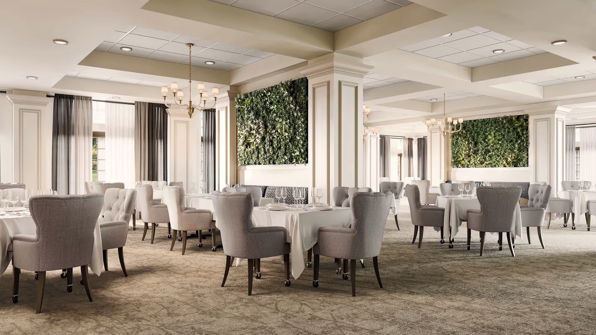 Spacious elegant dining room with round tables, upholstered chairs, chandeliers, and green wall panels.