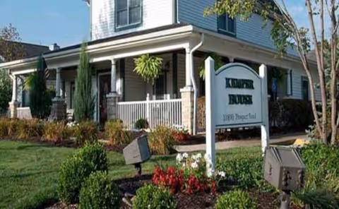 Front view of Kemper House Strongsville with sign and landscaped entrance.
