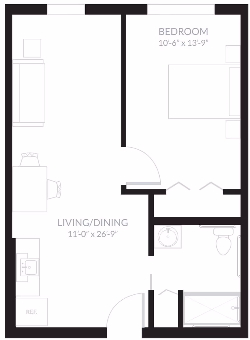Floor plan layout of a living/dining area, bedroom, and bathroom. The living/dining area measures 11 feet by 26 feet 9 inches and includes a kitchen section with a refrigerator and sink. The bedroom measures 10 feet 6 inches by 13 feet 9 inches. The bathroom includes a sink, toilet, and shower.