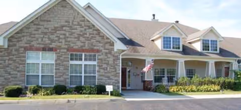 Front exterior of Brookdale Westerville, a stone-faced senior living building with an entrance porch.