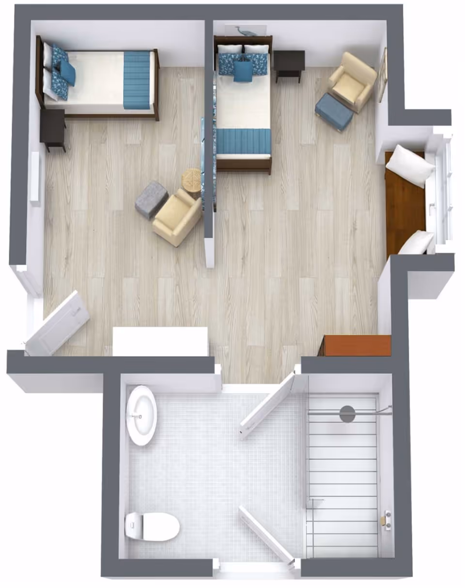 Top-down 3D floor plan of a small senior living suite with two single beds separated by a partial divider, a seating area, and a bathroom with shower, toilet, and sink.
