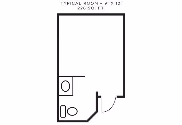 Floor plan of a typical room measuring 9 feet by 12 feet with a total area of 228 square feet. The layout includes a small bathroom area with a toilet and a sink, and an entrance door to the room.