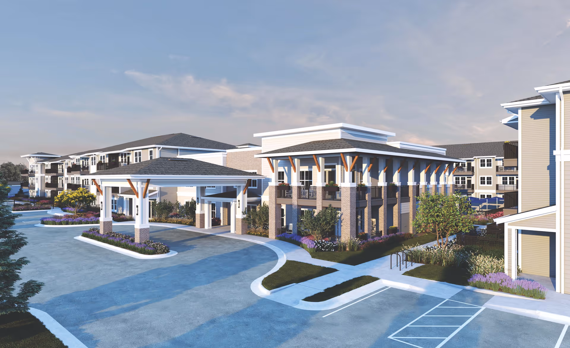 Exterior view of Sage at Cobblestone Creek senior living facility showing multiple connected buildings with covered entrance, landscaped greenery, and parking spaces under a partly cloudy sky.