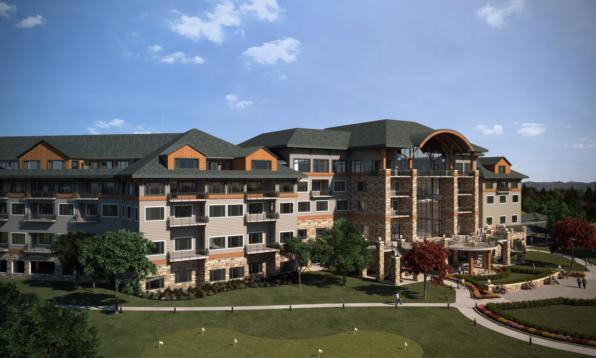 Exterior view of a large, multi-story senior living facility building with stone and siding facade, multiple windows, balconies, and a covered entrance. The surrounding area includes landscaped greenery, trees, a walking path, and a putting green in the foreground under a partly cloudy blue sky.
