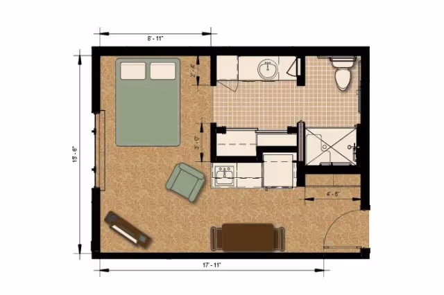Architectural floor plan of a studio apartment layout showing a bedroom area with a bed and chair, a kitchenette, a bathroom with a shower and toilet, and a small dining table with two chairs. Dimensions are marked around the perimeter.