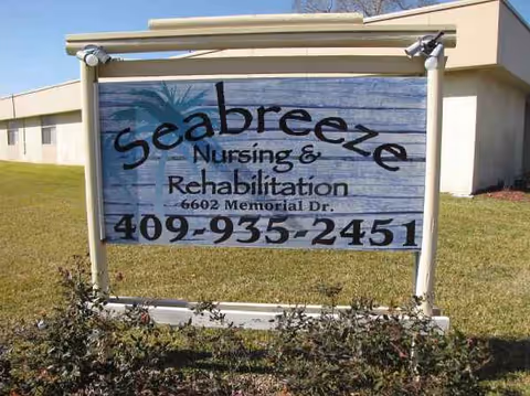 Outdoor sign displays Seabreeze Nursing and Rehabilitation with address 6602 Memorial Dr and phone.