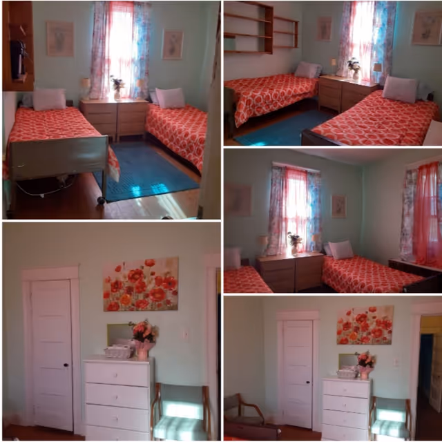 A collage of images showing a bedroom with two single beds covered in red patterned bedspreads, a blue rug on the wooden floor, a window with floral curtains, a wooden dresser with a flower vase, a white chest of drawers with a flower arrangement on top, a wooden chair, and a door. The walls are painted light green and decorated with framed pictures.
