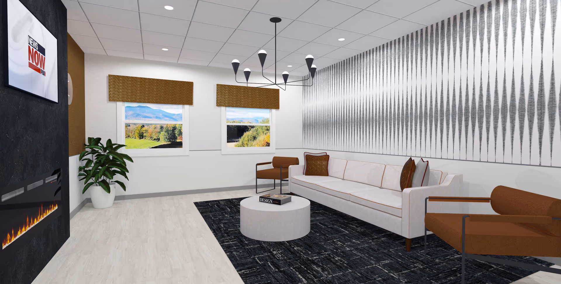A modern living room with a white couch, two brown armchairs, a round white coffee table with a book on it, a black patterned rug, a wall-mounted TV displaying News Now, a linear fireplace below the TV, two windows with brown blinds showing a scenic outdoor view, a large potted plant, and a geometric chandelier hanging from the ceiling. The far wall features a black and white abstract patterned wallpaper.