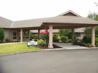 Entrance to Markam House senior living facility with a covered porte-cochere.