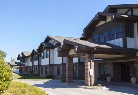 Exterior view of Lakeview Lodge Assisted Living at Friendship Village entrance.
