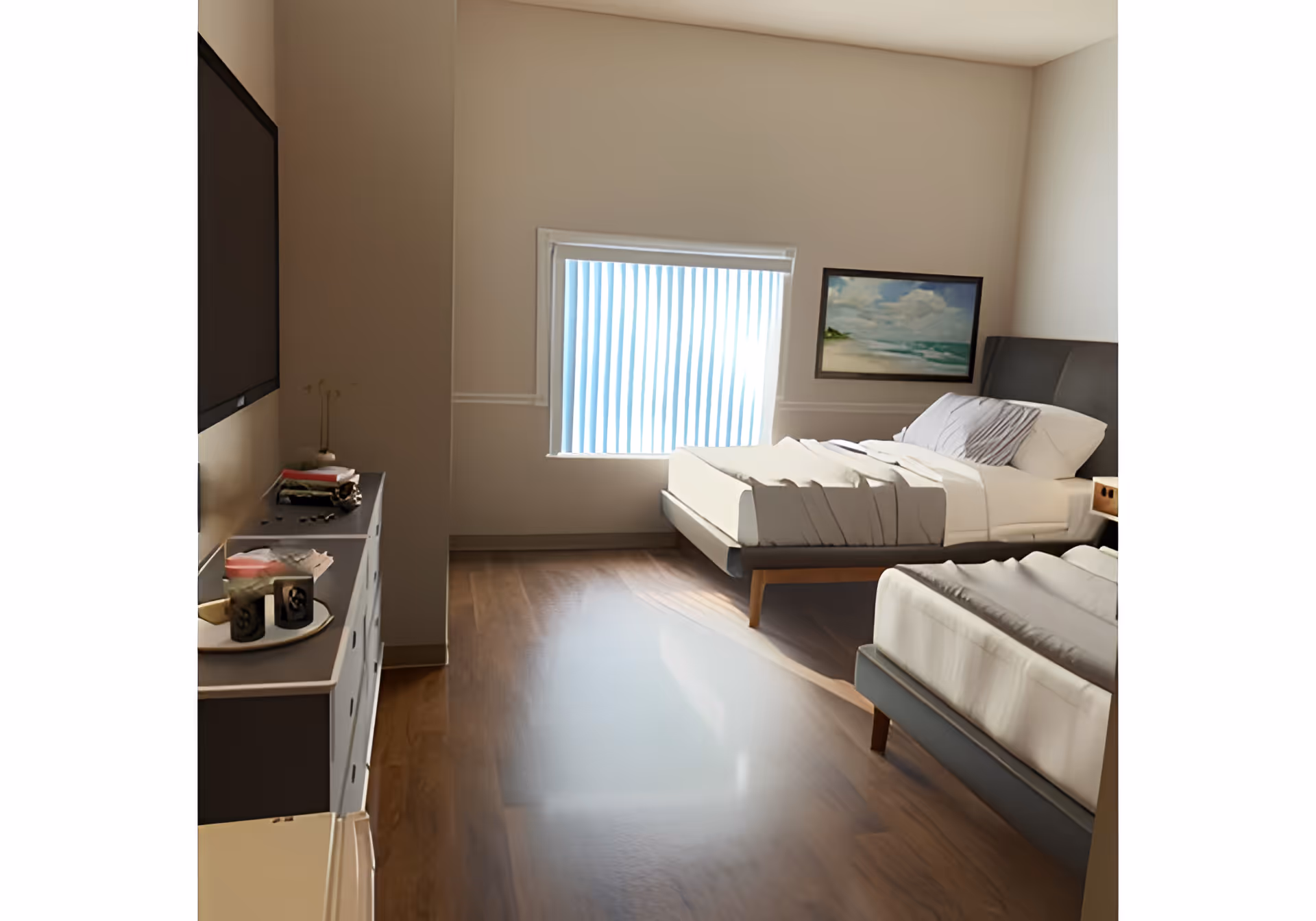 Bright, simple bedroom with two single beds, a dresser and wall-mounted TV, a window with vertical blinds and a beach painting.