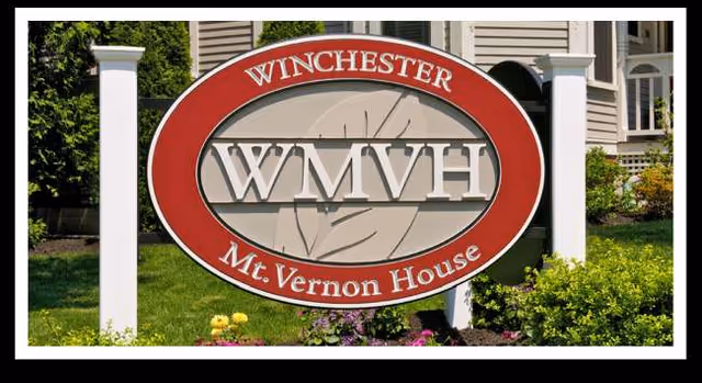 Front yard sign for Winchester Mount Vernon House in front of a residence.
