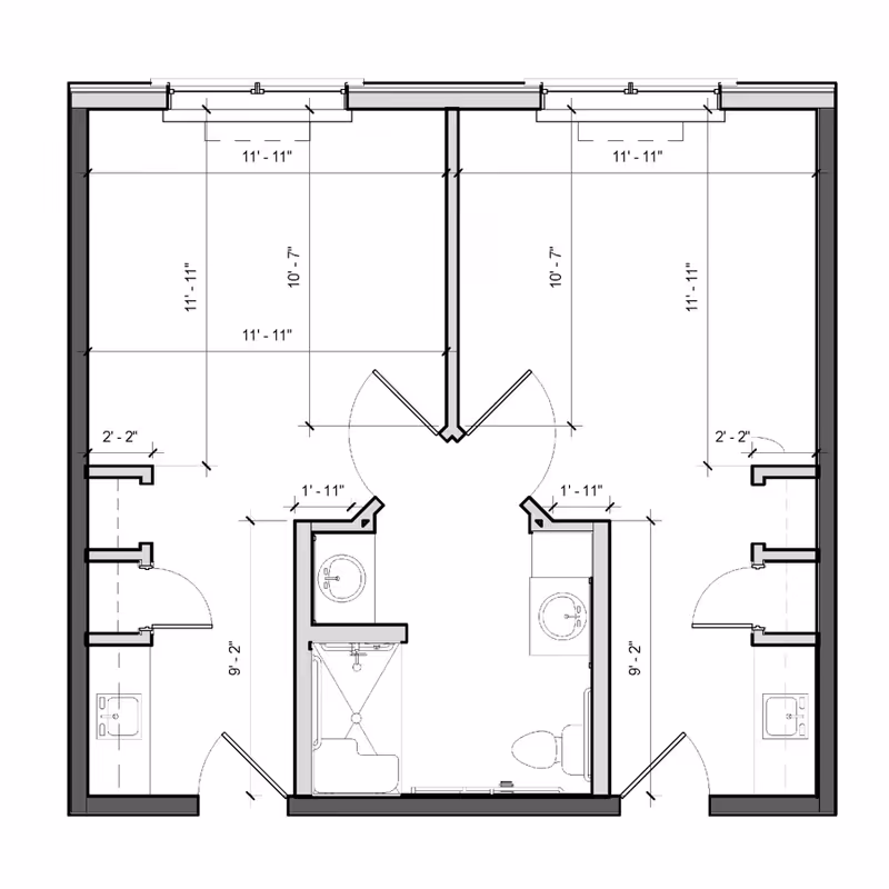 Architectural floor plan showing two adjacent rooms with measurements. Each room has a small bathroom area with a sink, toilet, and shower. The layout includes doors and windows with dimensions labeled.